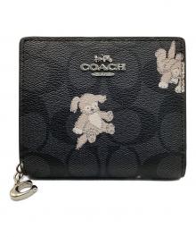 COACH（コーチ）の古着「2つ折り財布」｜ブラック×ベージュ
