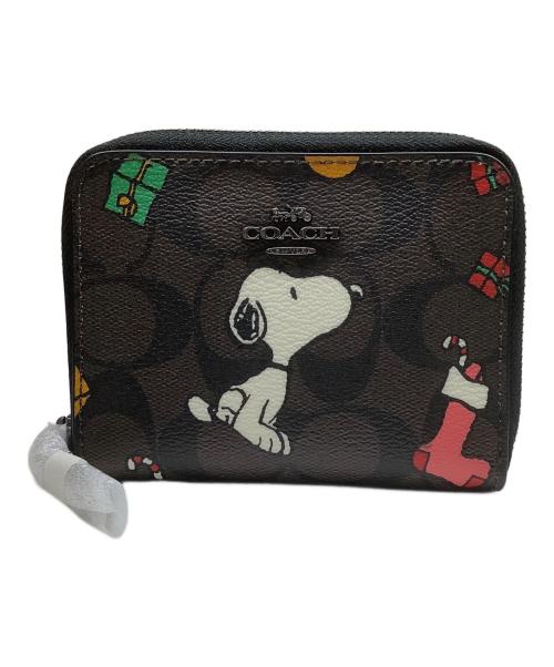 COACH（コーチ）COACH (コーチ) PEANUTS (ピーナッツ) 2つ折り財布 ブラウンの古着・服飾アイテム