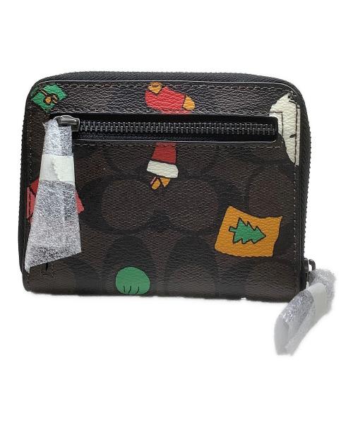 COACH（コーチ）COACH (コーチ) PEANUTS (ピーナッツ) 2つ折り財布 ブラウンの古着・服飾アイテム