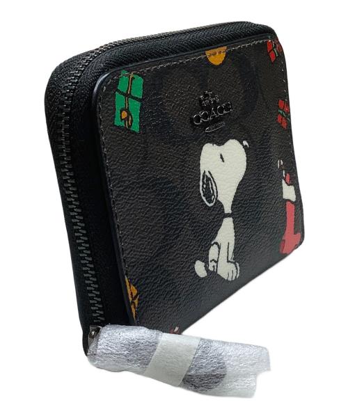 COACH（コーチ）COACH (コーチ) PEANUTS (ピーナッツ) 2つ折り財布 ブラウンの古着・服飾アイテム