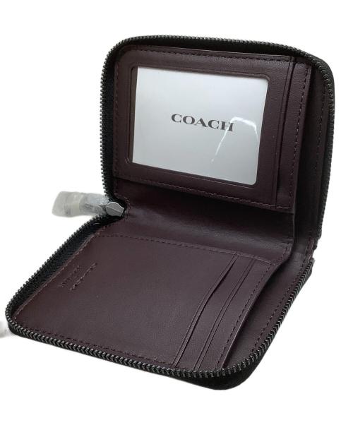 COACH（コーチ）COACH (コーチ) PEANUTS (ピーナッツ) 2つ折り財布 ブラウンの古着・服飾アイテム