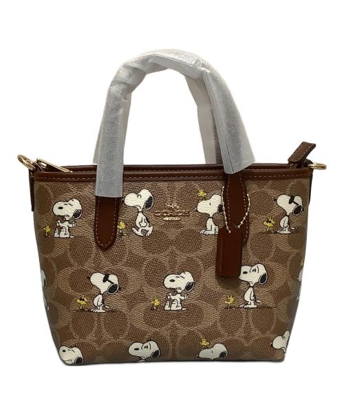 COACH（コーチ）COACH (コーチ) PEANUTS (ピーナッツ) ミニ2WAYバッグ ブラウン 未使用品の古着・服飾アイテム