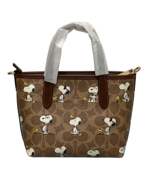 COACH（コーチ）COACH (コーチ) PEANUTS (ピーナッツ) ミニ2WAYバッグ ブラウン 未使用品の古着・服飾アイテム