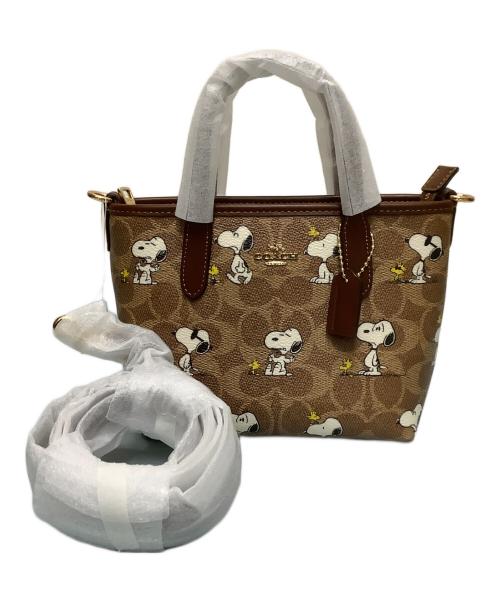 COACH（コーチ）COACH (コーチ) PEANUTS (ピーナッツ) ミニ2WAYバッグ ブラウン 未使用品の古着・服飾アイテム