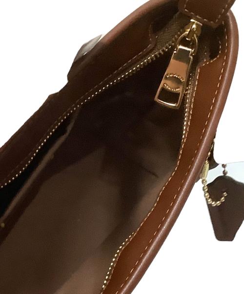 COACH（コーチ）COACH (コーチ) PEANUTS (ピーナッツ) ミニ2WAYバッグ ブラウン 未使用品の古着・服飾アイテム