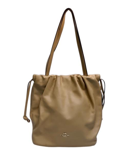 COACH（コーチ）COACH (コーチ) フェイ ドローストリングトートバッグ ベージュの古着・服飾アイテム