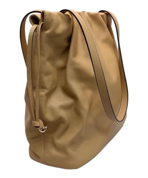COACH（コーチ）COACH (コーチ) フェイ ドローストリングトートバッグ ベージュの古着・服飾アイテム