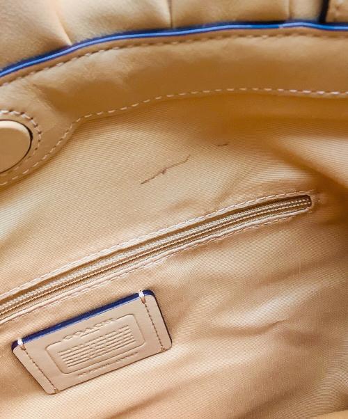 COACH（コーチ）COACH (コーチ) フェイ ドローストリングトートバッグ ベージュの古着・服飾アイテム