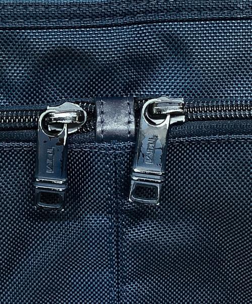 TUMI（トゥミ）TUMI (トゥミ) エクスパンダブルスクエアトートバッグ ネイビーの古着・服飾アイテム