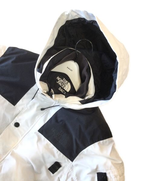 THE NORTH FACE×sacai（ザノースフェイス×サカイ）THE NORTH FACE×sacai (ザノースフェイス×サカイ) ボンバージャケット ブラック×ホワイト サイズ:AISA Mの古着・服飾アイテム