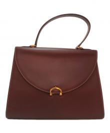 Cartier（カルティエ）の古着「ハンドバッグ」｜ボルドー