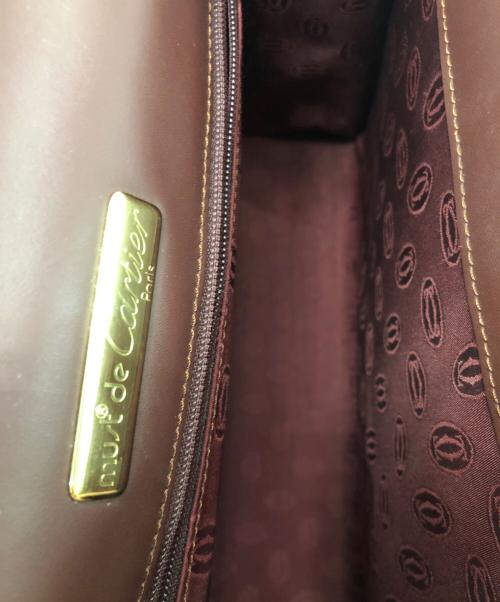 Cartier（カルティエ）Cartier (カルティエ) ハンドバッグ ボルドーの古着・服飾アイテム