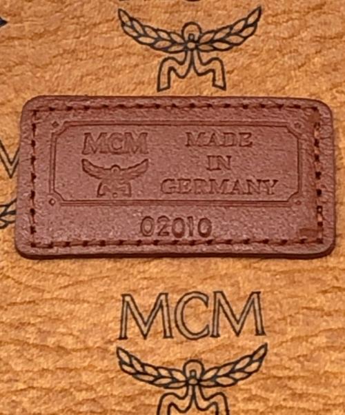 MCM（エムシーエム）MCM (エムシーエム) トラベルショルダーバッグ ブラウンの古着・服飾アイテム
