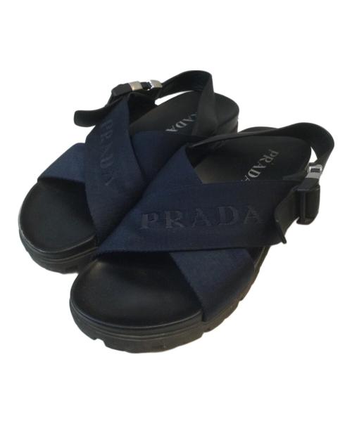 PRADA（プラダ）PRADA (プラダ) クロスバックルサンダル ブラック サイズ:7の古着・服飾アイテム