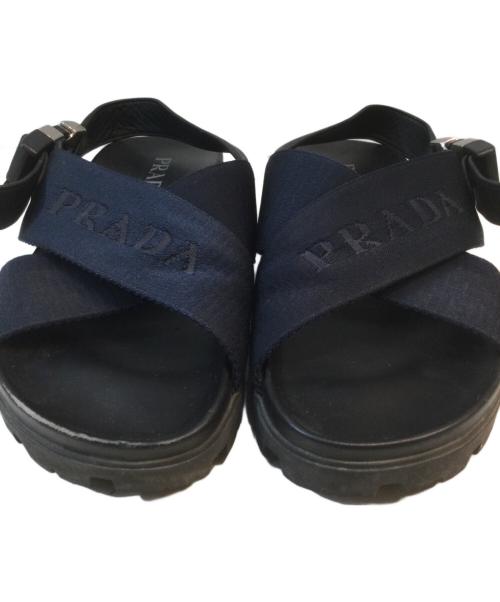 PRADA（プラダ）PRADA (プラダ) クロスバックルサンダル ブラック サイズ:7の古着・服飾アイテム