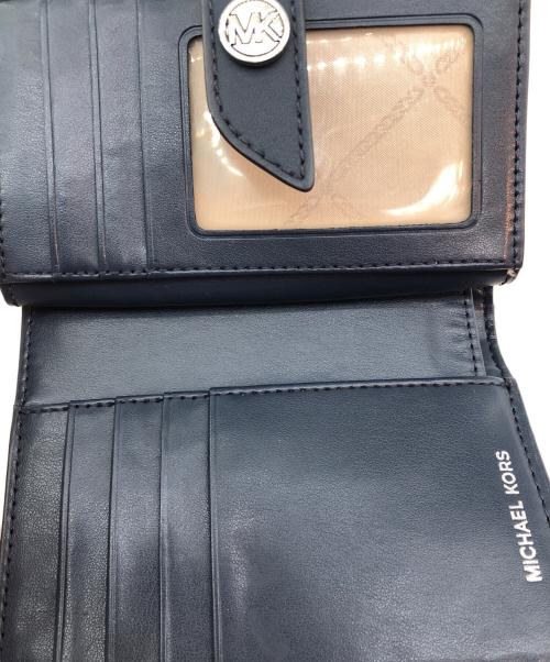 MICHAEL KORS（マイケルコース）MICHAEL KORS (マイケルコース) 2つ折り財布 スカイブルーの古着・服飾アイテム