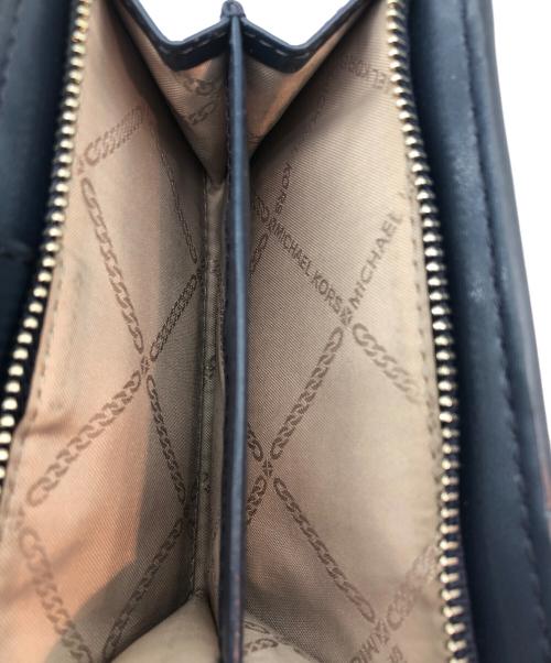 MICHAEL KORS（マイケルコース）MICHAEL KORS (マイケルコース) 2つ折り財布 スカイブルーの古着・服飾アイテム