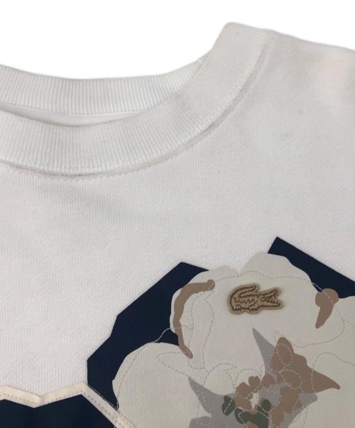 LACOSTE（ラコステ）LACOSTE (ラコステ) クルーネックスウェット フラワーグラフィック ホワイト サイズ:34の古着・服飾アイテム