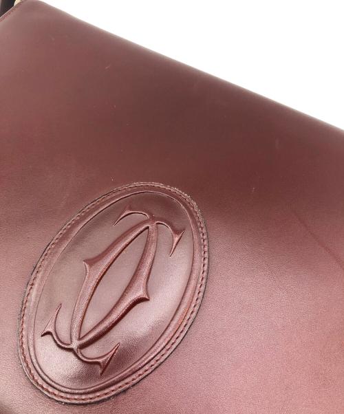must de cartier（マストドゥカルティエ）must de Cartier (マストドゥカルティエ) ショルダーバッグ ボルドーの古着・服飾アイテム