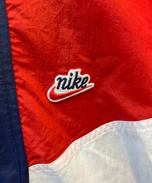 NIKE（ナイキ）NIKE (ナイキ) ナイロンジャケット ネイビー×レッド サイズ:XL 未使用品の古着・服飾アイテム