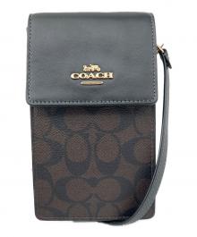 COACH（コーチ）の古着「ショルダーポーチ ノース／サウス フォーン クロスボディ・シグネチャー キャンバス」｜ブラウン