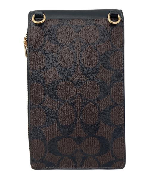 COACH（コーチ）COACH (コーチ) ショルダーポーチ ノース／サウス フォーン クロスボディ・シグネチャー キャンバス ブラウン サイズ:記載なしの古着・服飾アイテム