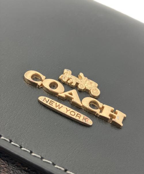 COACH（コーチ）COACH (コーチ) ショルダーポーチ ノース／サウス フォーン クロスボディ・シグネチャー キャンバス ブラウン サイズ:記載なしの古着・服飾アイテム