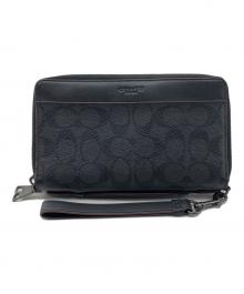 COACH（コーチ）の古着「クラッチウォレット シグネチャー」｜ブラック