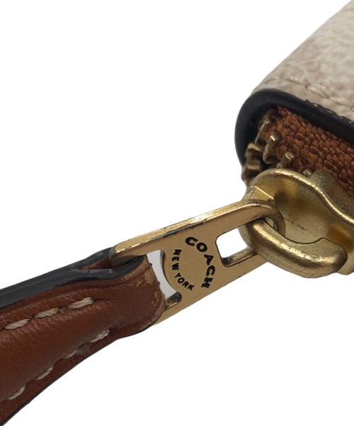 COACH（コーチ）COACH (コーチ) エッセンシャルスリムアコーディオンジップウォレット ホースキャリッジ ホワイト×ブラウン サイズ:不明の古着・服飾アイテム