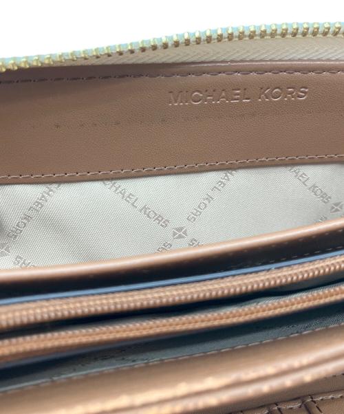MICHAEL KORS（マイケルコース）MICHAEL KORS (マイケルコース) JET SET TRAVEL LG TRVL CONTINENTAL アイボリーの古着・服飾アイテム