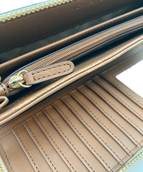MICHAEL KORS（マイケルコース）MICHAEL KORS (マイケルコース) JET SET TRAVEL LG TRVL CONTINENTAL アイボリーの古着・服飾アイテム