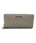 MICHAEL KORS（マイケルコース）の古着「JET SET TRAVEL LG TRVL CONTINENTAL」｜アイボリー