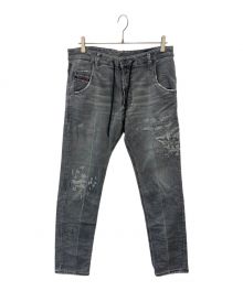 DIESEL（ディーゼル）の古着「ダメージ加工デニムパンツ」｜ブラック