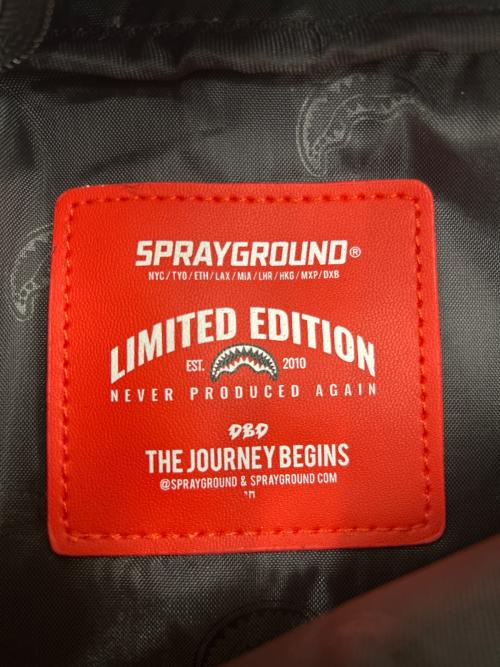 SPRAYGROUND（スプレーグランド）SPRAYGROUND (スプレーグランド) SPRAYGROUND　ボディバッグ ホワイト×ブラック×レッド 未使用品の古着・服飾アイテム