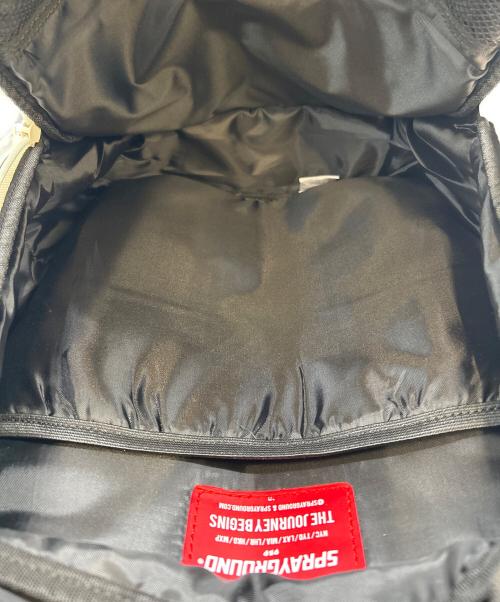 SPRAYGROUND（スプレーグランド）SPRAYGROUND (スプレーグランド) バックパック ホワイト×グレー 未使用品の古着・服飾アイテム