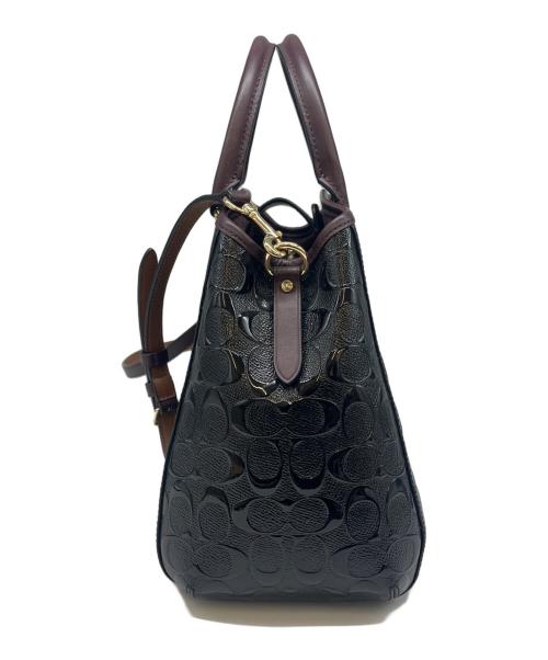 COACH（コーチ）COACH (コーチ) COACH  デボスド シグネチャー パテントレザー スモールマーゴット キャリーオール 2WAYバッグ ブラウン×ブラックの古着・服飾アイテム