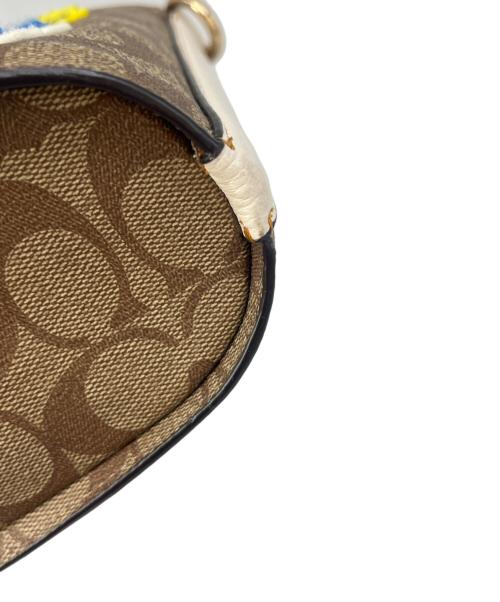 COACH（コーチ）COACH (コーチ) COACH シグネチャー　スヌーピーコラボ　ショルダーバッグの古着・服飾アイテム