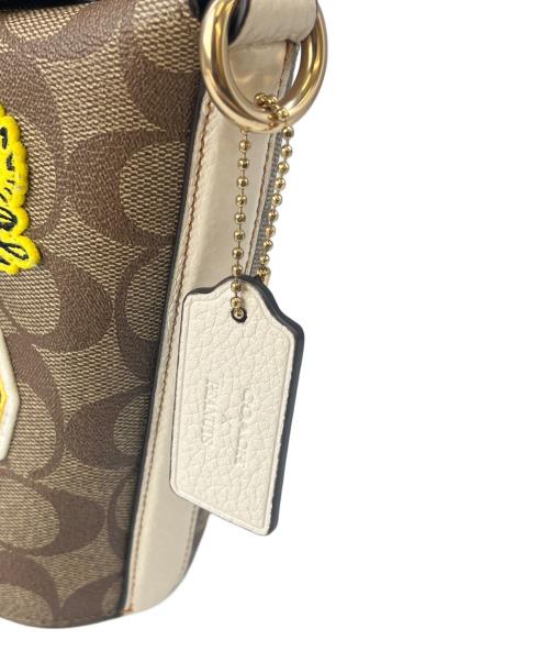 COACH（コーチ）COACH (コーチ) COACH シグネチャー　スヌーピーコラボ　ショルダーバッグの古着・服飾アイテム