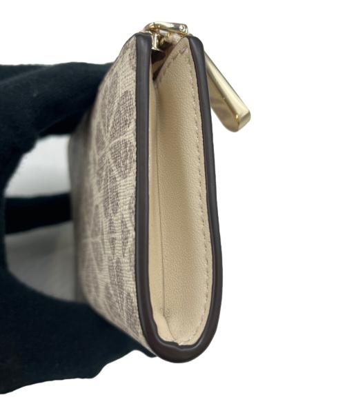 Kate Spade（ケイトスペード）Kate Spade (ケイトスペード) Kate Spade　フラワーコーテッドキャンバス　コインケース アイボリーの古着・服飾アイテム