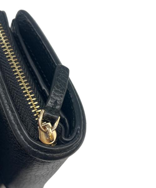 TORY BURCH（トリーバーチ）TORY BURCH (トリーバーチ) TORY BURCH 　2つ折り財布 ブラックの古着・服飾アイテム