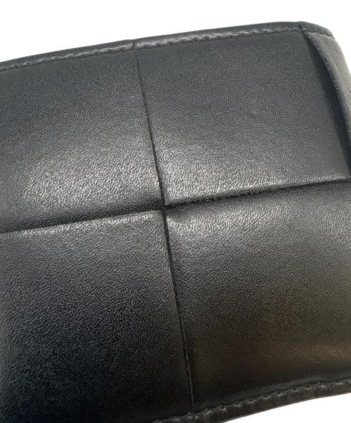 BOTTEGA VENETA（ボッテガベネタ）BOTTEGA VENETA (ボッテガベネタ) BOTTEGA VENETA   カセット  2つ折り財布 ブラックの古着・服飾アイテム