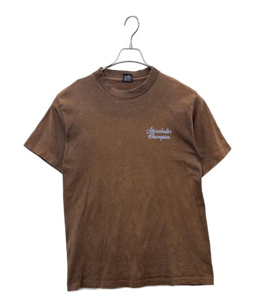 stussy（ステューシー）stussy (ステューシー) stussy　Studebaker Champion　半袖Tシャツ ブラウン サイズ:Mの古着・服飾アイテム