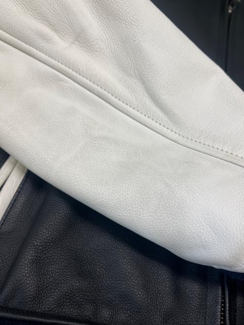 KUSHITANI（クシタニ）KUSHITANI (クシタニ) レザーライダースジャケット ブラック×ホワイト サイズ:Lの古着・服飾アイテム