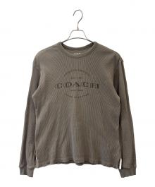 COACH（コーチ）の古着「COACH　長袖カットソー」｜カーキ