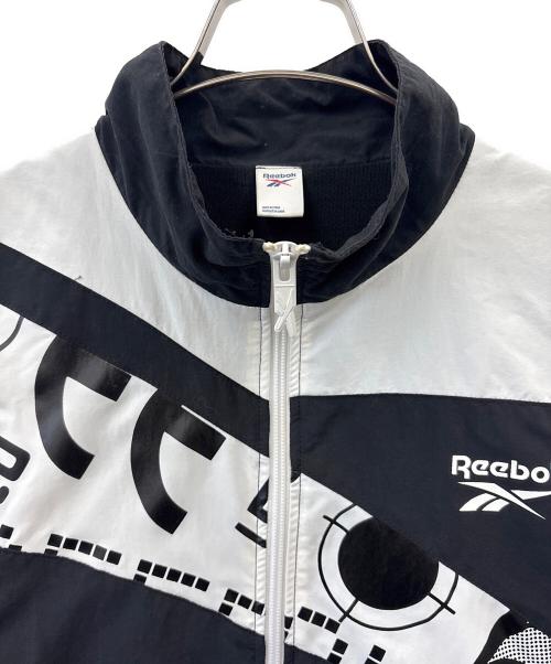 REEBOK（リーボック）REEBOK (リーボック) THE BLACK EYE PATCH (ブラックアイパッチ) REEBOK × THE BLACK EYE PATCH　ジャケット ブラック×ホワイト サイズ:Oの古着・服飾アイテム