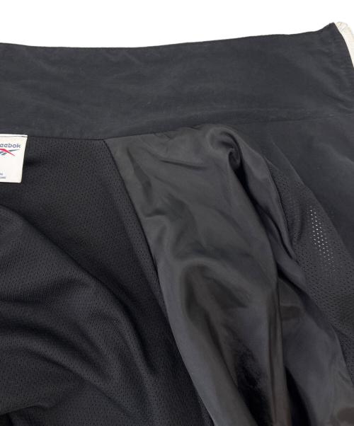 REEBOK（リーボック）REEBOK (リーボック) THE BLACK EYE PATCH (ブラックアイパッチ) REEBOK × THE BLACK EYE PATCH　ジャケット ブラック×ホワイト サイズ:Oの古着・服飾アイテム