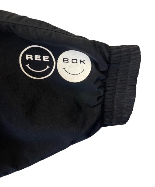 REEBOK（リーボック）REEBOK (リーボック) THE BLACK EYE PATCH (ブラックアイパッチ) REEBOK × THE BLACK EYE PATCH　ジャケット ブラック×ホワイト サイズ:Oの古着・服飾アイテム