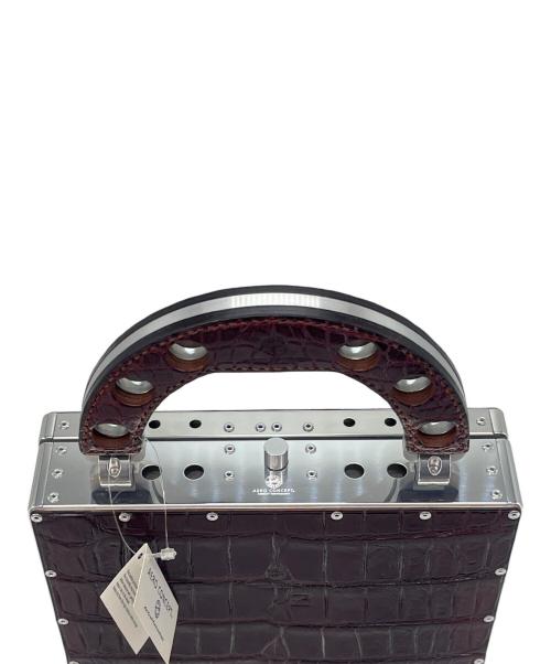 AERO CONCEPT（エアロコンセプト）AERO CONCEPT (エアロコンセプト) AERO CONCEPT　TICCO-CROCO　ジュラルミン　パーティバッグ ブラウンの古着・服飾アイテム