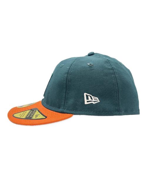New Era（ニューエラ）New Era (ニューエラ) UNDEFEATED (アンディフィーテッド) New Era　UNDEFEATED　59FIFTY　キャップ グリーン×オレンジ 未使用品の古着・服飾アイテム