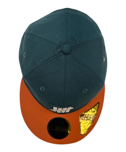 New Era（ニューエラ）New Era (ニューエラ) UNDEFEATED (アンディフィーテッド) New Era　UNDEFEATED　59FIFTY　キャップ グリーン×オレンジ 未使用品の古着・服飾アイテム